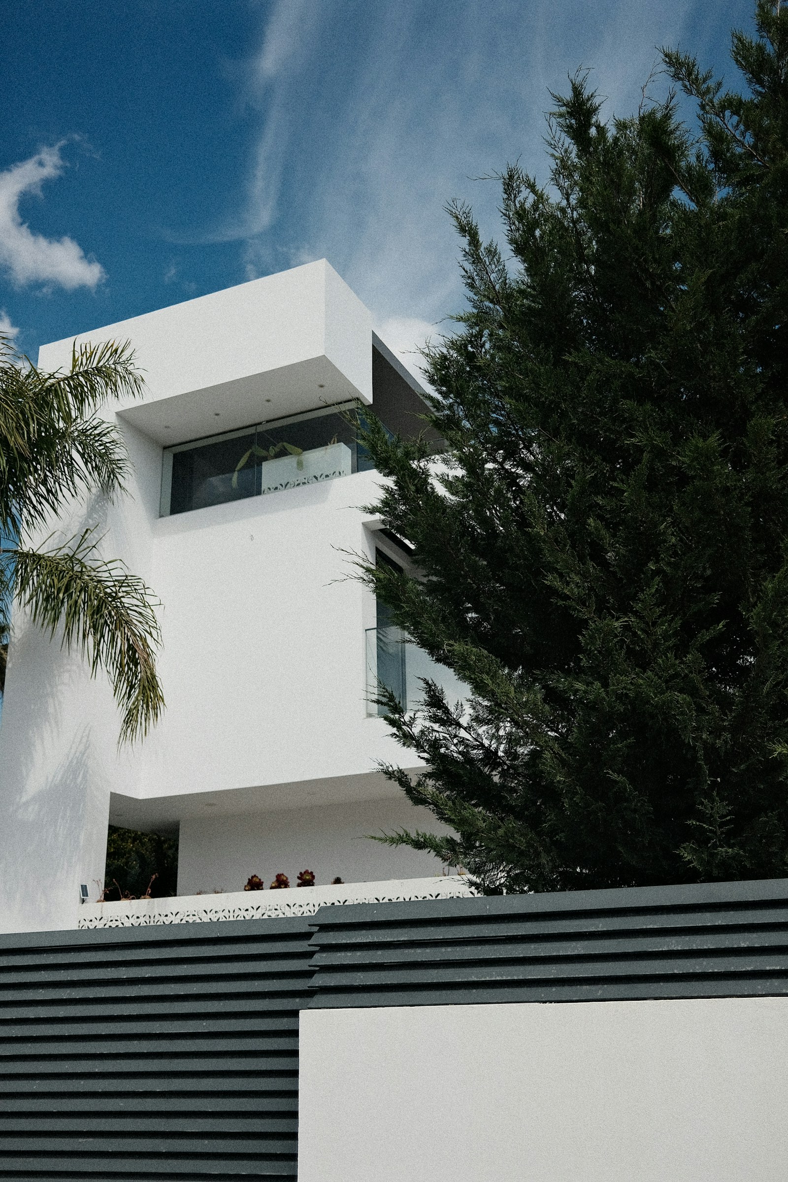 White painted exterior of a modern home